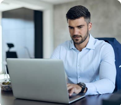 Employee working at a laptop